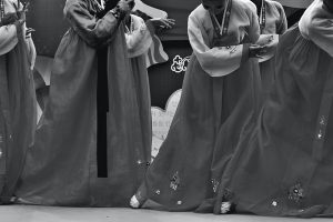 Women wearing traditional maxi dresses