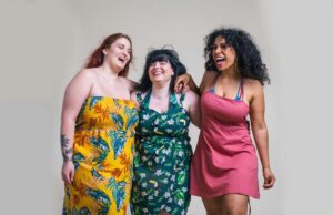 Women wearing maxi dresses laughing